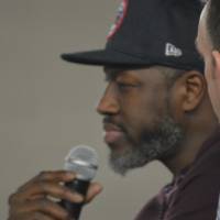 Ben Wallace looking at audience